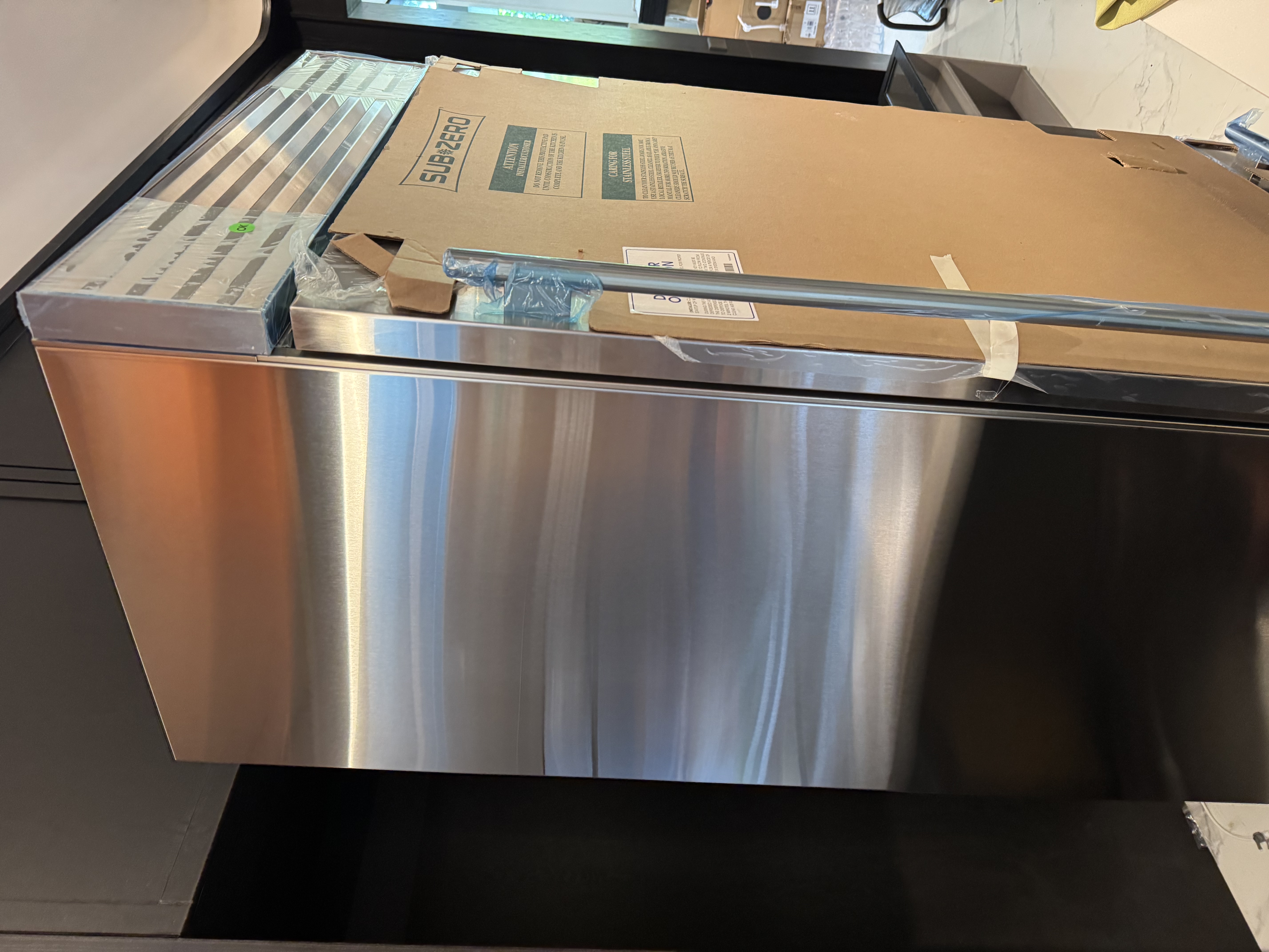 Sub-Zero stainless steel fridge installed